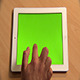 Hand Scrolling on a Green Screen Tablet - VideoHive Item for Sale