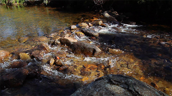 Water Flowing Down Stream Over Rocks