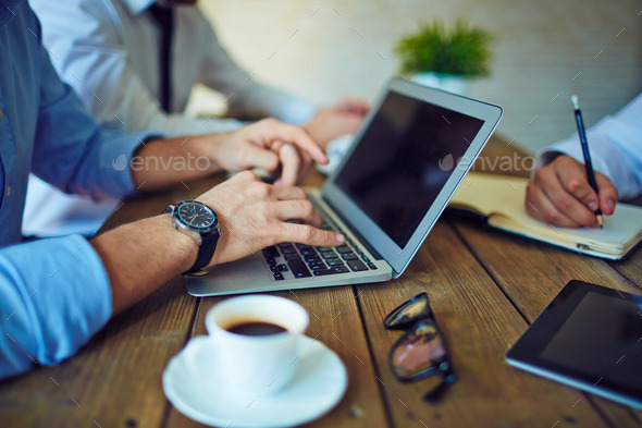 Typing at meeting - Stock Photo - Images