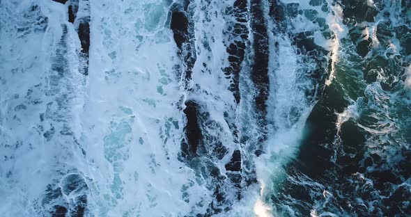 Aerial view of waves hitting the rocks in Curtis island lighthouse Camden Maine USA alt