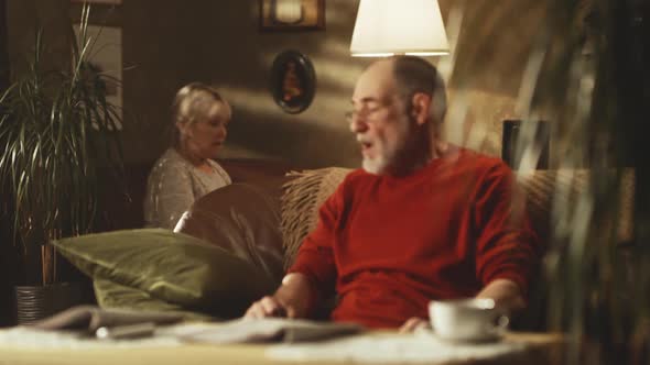 Elderly Couple Arguing at Home alt