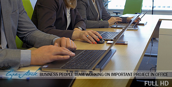 Journalists and Business Team Meeting Using Laptops