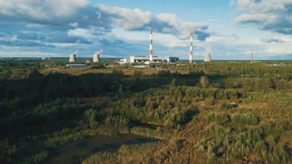 Old thermal power plant outside the city. Aerial footage.