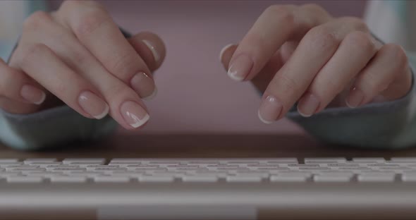 Woman Typing On A Keyboard Close Up