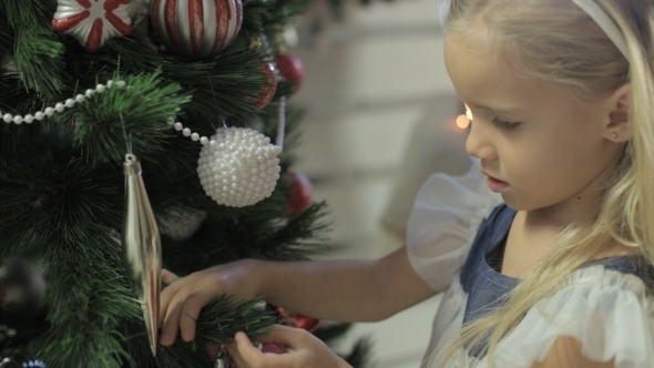 Little Lovely Girl In Beautiful Dress Decorates