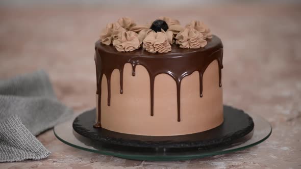 Chocolate Cake with Glaze on the Rotating Stand
