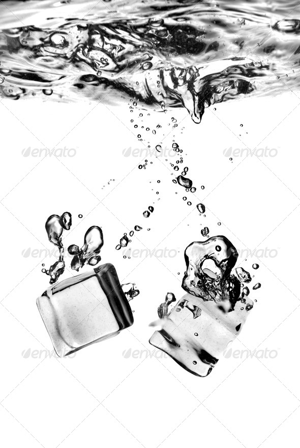 ice cubes dropped into water with splash isolated on white Stock Photo ...