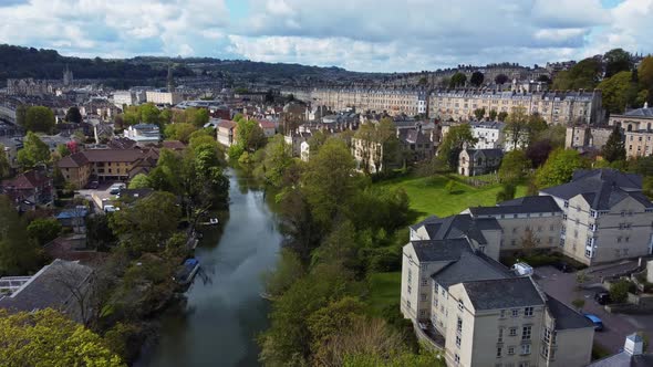 Idyllic drone shot of Bath, somerset facing west along the River Avon alt