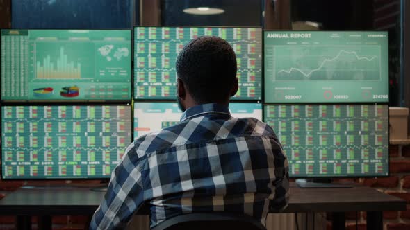 Forex Trader Analyzing Market Charts to Plan Commodities Exchange alt