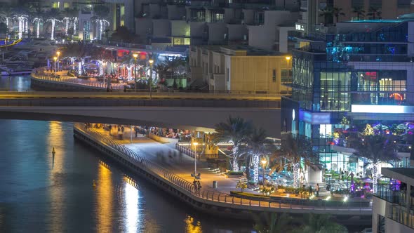Water Canal on Dubai Marina Skyline at Night Timelapse alt