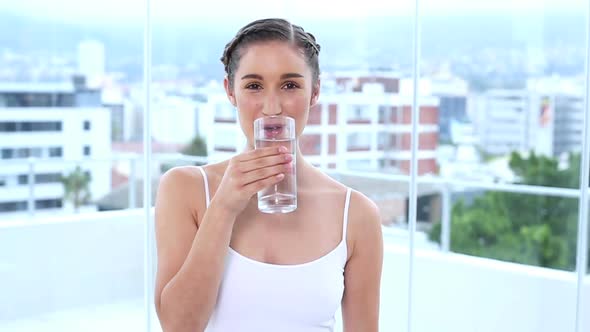 Smiling Young Woman Drinking Water 2 alt
