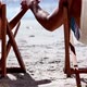Lovely Couple Sitting On The Beach - VideoHive Item for Sale