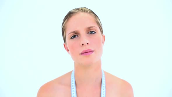 Troubled Woman With A Measuring Tape Around Her Neck alt