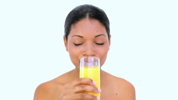 Beautiful Woman Drinking Orange Juice alt