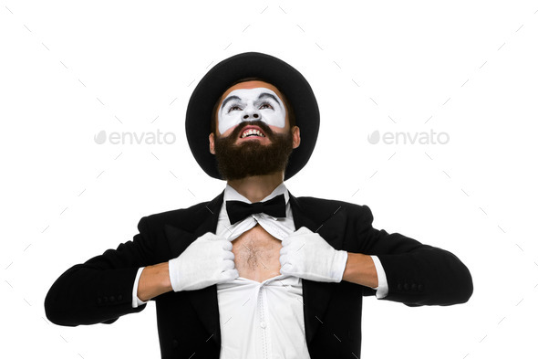 mime as a businessman tearing his shirt off