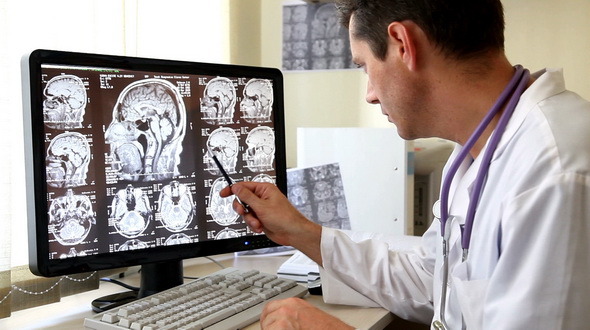 Doctor Examining CT Scan