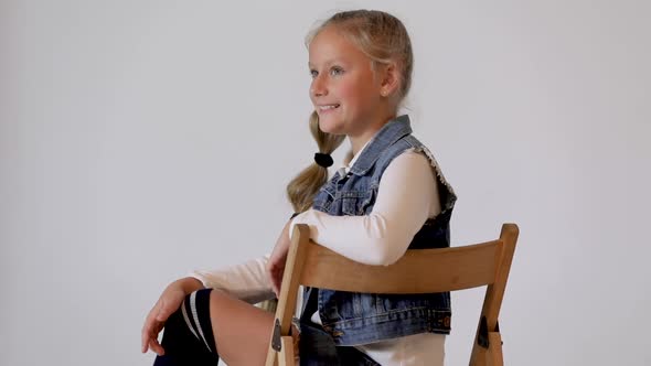 Cute Child Posing in the Photo Studio