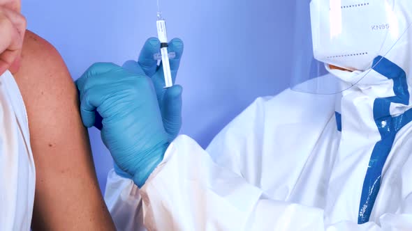 Coronavirus vaccine injection in a hospital. Covid-19 vaccination concept.