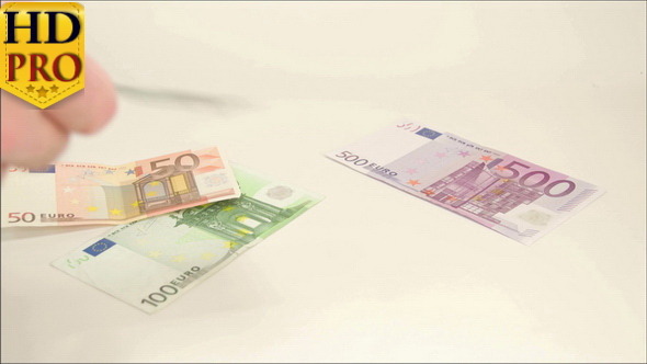 Five Euro Bills Thrown on the Table