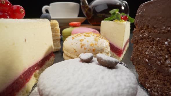 Variety of Cakes with Fruits, Cheese Cake, Chocolate Cake and Cream Puff Cake, Strawberry and Mint alt