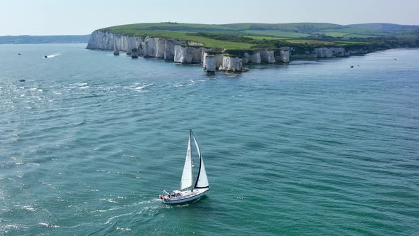 A Sailing Ship at Old Harry Rocks in the UK alt
