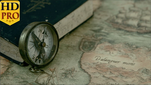 Left Angle View of the Compass and the Book
