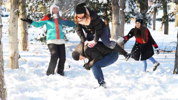 Young People Playing in Wintertime