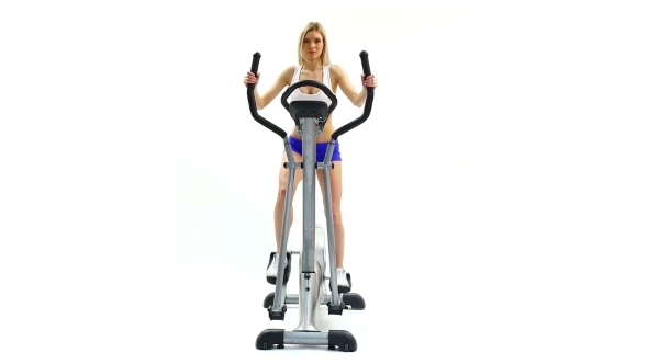 Attractive Woman Training On Exerciser 