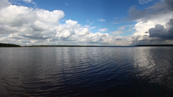 Open Water And Cloudscape At Summer Day
