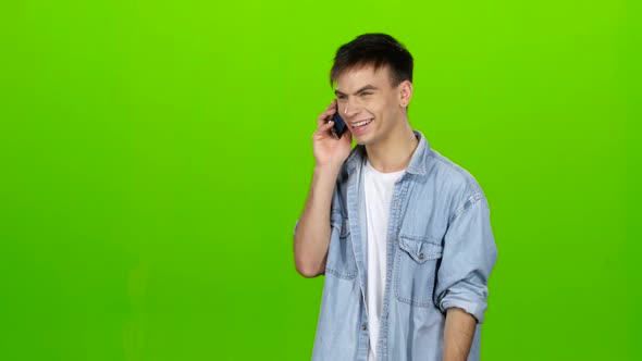 Guy Is Flirting with His Girlfriend on the Phone. Green Screen alt