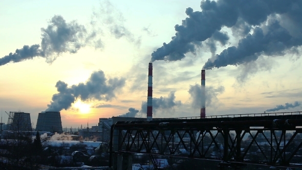 Industrial Winter View At Sunset With Smoke