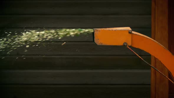 Wood Chipper Spitting Out Chips alt