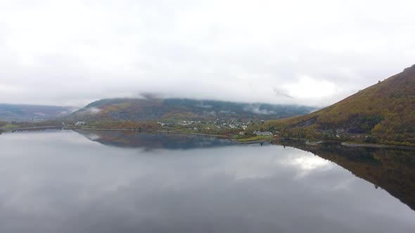 Aerial drone view of Loch Leven in Scotland on a moody misty day