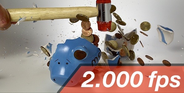 Piggy Bank Gets Destroyed by Hammer alt