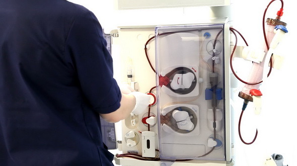 Nurse with Dialysis Medical Device