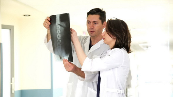 Two Doctors with X-ray Image