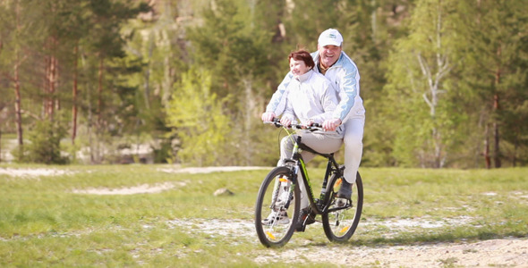 2 people on a bike