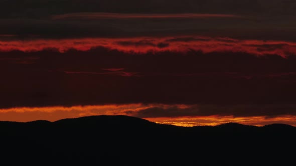 Fast Clouds Block the Sun at Dawn Time Lapse Zoom Out alt