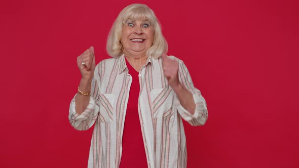 Stylish Senior Old Woman Shouting Raising Fists in Gesture I Did It Celebrating Success Winning alt