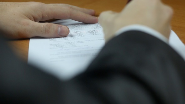 Businessman Signs A Contract