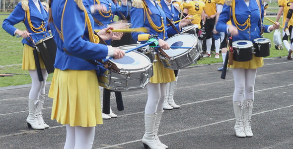 Girls Playing Drums on a Rugby Match alt