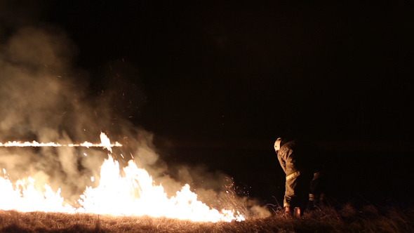 Firefighters extinguish a fire alt