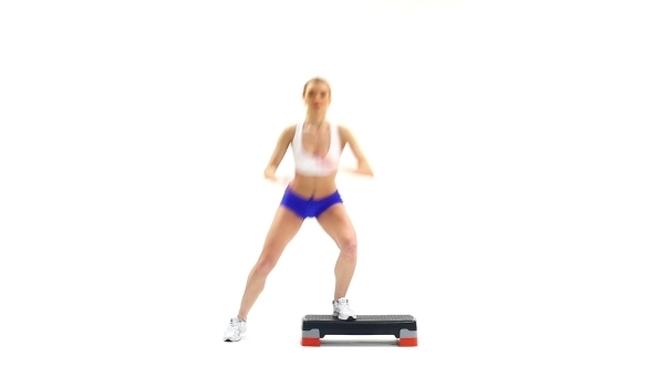 Slim Blonde Young Woman Exercising