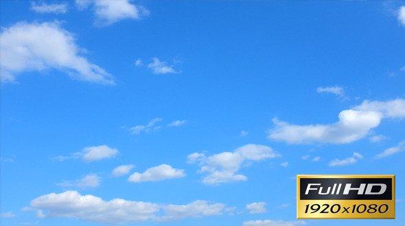 Clouds Float Against the Blue Sky  alt