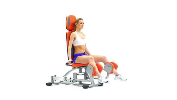 Blonde Young Woman On Isodynamic Exerciser