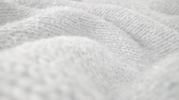 Extreme Detail View of Sheep Wool Cloth Texture Flowing in Macro Dolly Shot alt