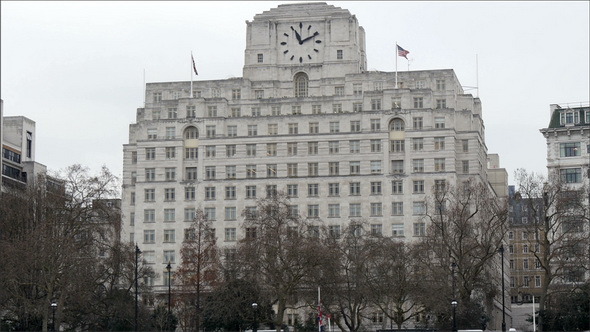 The Huge White Building with a Black Clock on Top