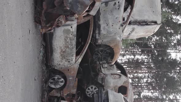 Vertical Video of the War in Ukraine  Destroyed Cars alt