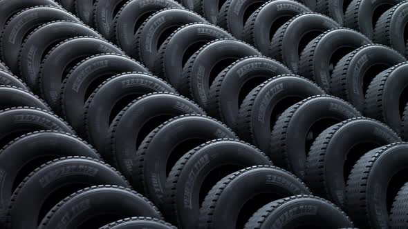 Endless stack of new car tires. Automotive modern manufacturing rubber.
