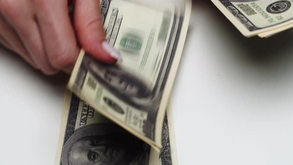 Counting American Hundred Dollar Banknotes alt